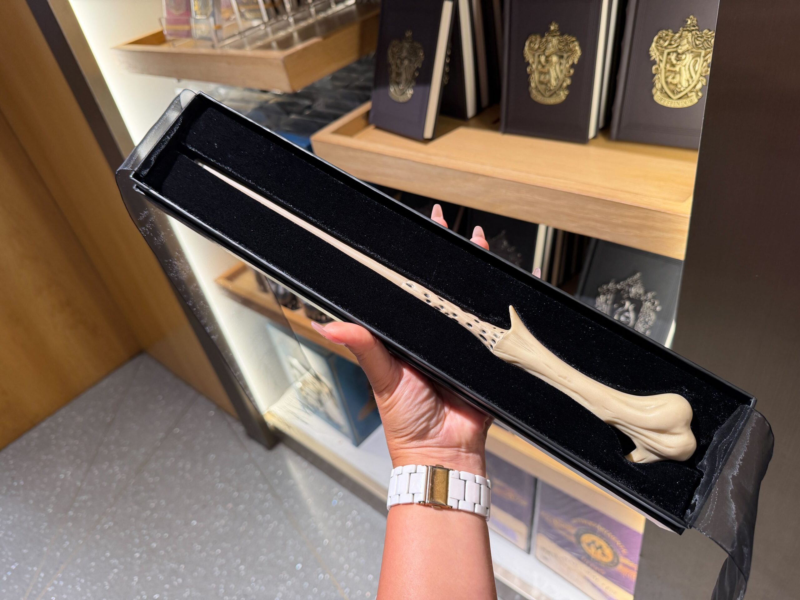 Close-up view of Voldemort's distinctive bone-white wand design
